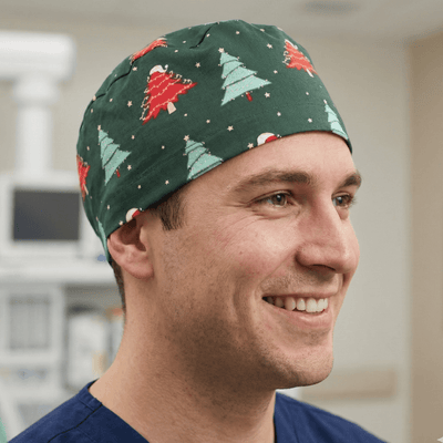 Christmas Trees With Tinsel scrub cap shown on model