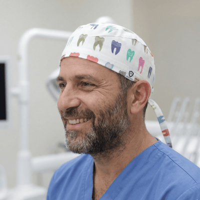 Colourful Tooth Dentist scrub cap shown on model