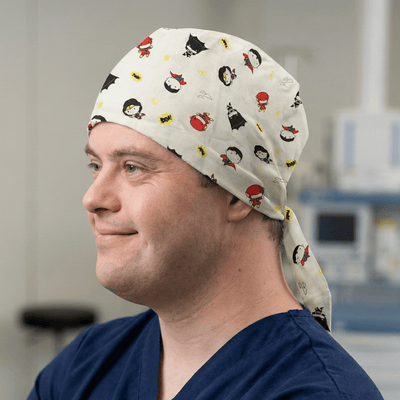 DC Kawaii | Batman | Wonder Woman On White scrub cap shown on model