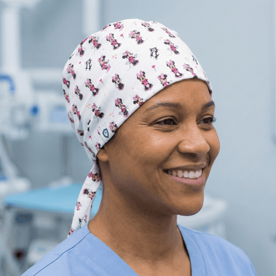 Disney Minnie Mouse scrub cap shown on model