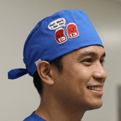 Embroidery - Blood B Positive - scrub cap shown on model