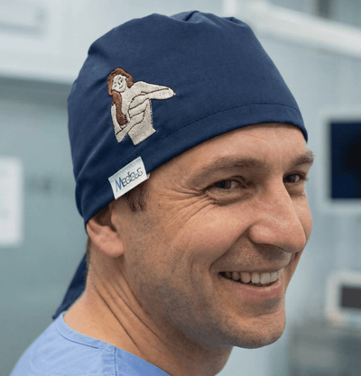 Embroidery - Breast Cancer Awareness - scrub cap shown on model