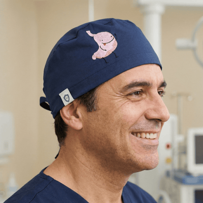 Embroidery - Happy Stomach - scrub cap shown on model