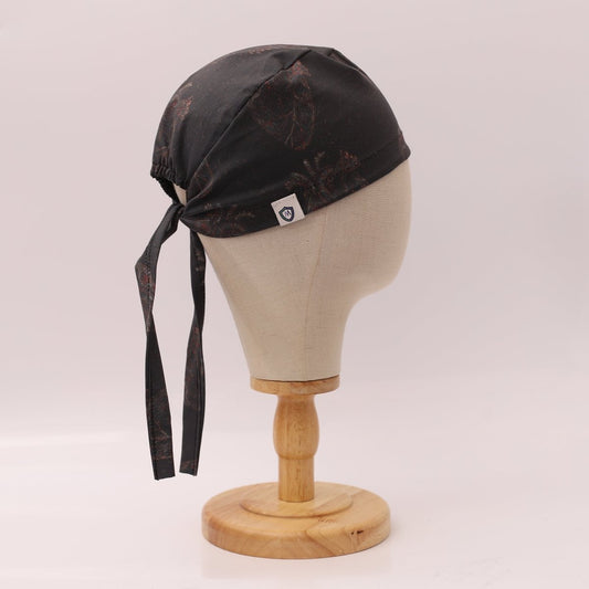 Gorro quirúrgico negro con corazón descolorido