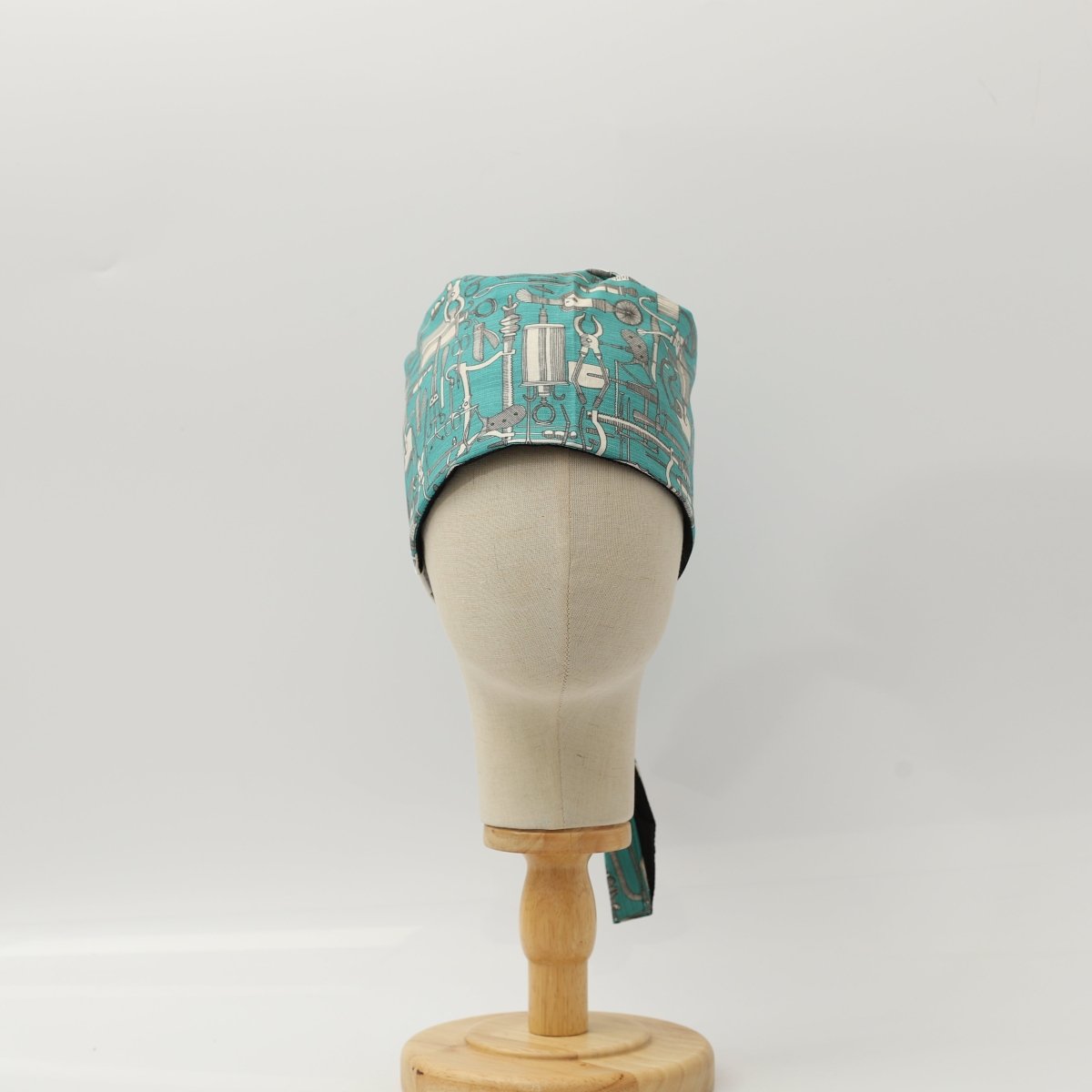 Hospital Tools Surgeons Table On Teal Blue Scrub Cap