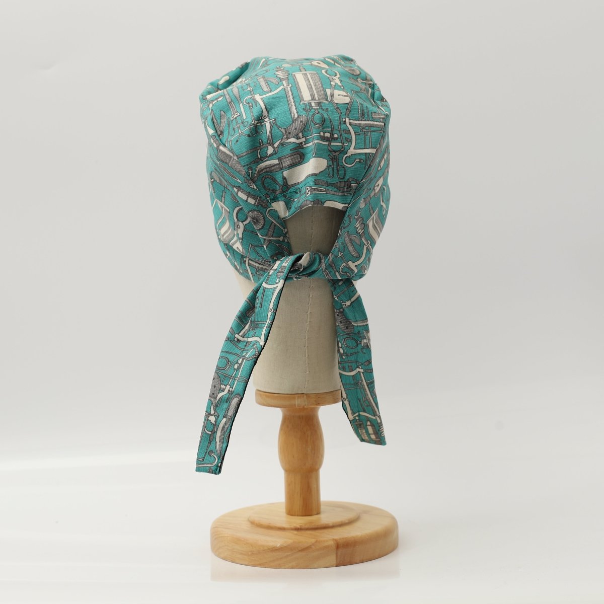 Hospital Tools Surgeons Table On Teal Blue Scrub Cap