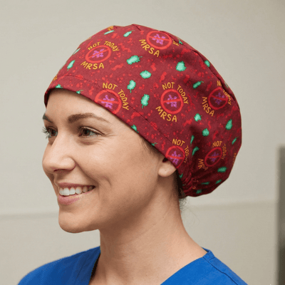 Red MRSA awareness print scrub cap with antimicrobial text pattern