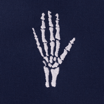 Skeleton Hand pre-designed embroidery on a reusable scrub cap