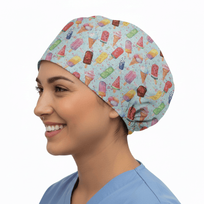 Colourful ice lolly patterned scrub cap with multicoloured popsicles on light blue background