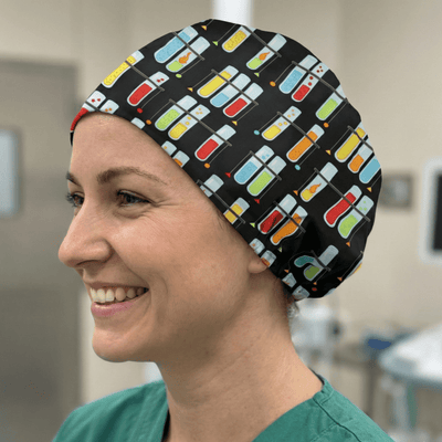 Colourful test tube pattern scrub cap with multi-coloured capsules on black background