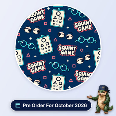 Squint Game scrub cap print: eye charts with shapes, glasses and squinting eyes on navy, with a Pre Order For October 2026 badge