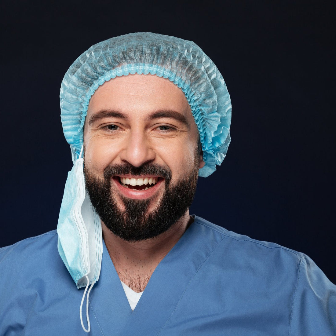 Close-up portrait of a surgeon wearing a scrub cap
