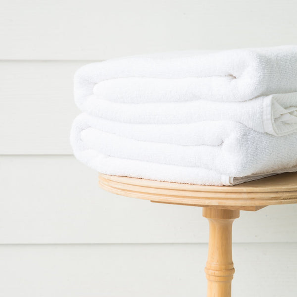 Clean folded white linen towels
