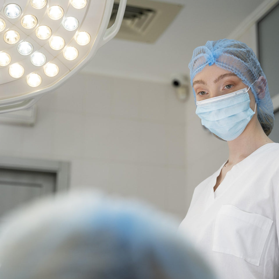 Doctor wearing surgical equipment in an operating room