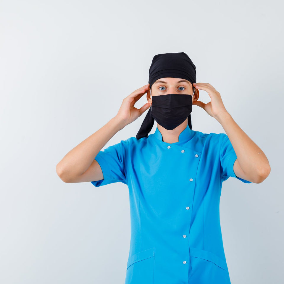 Healthcare worker wearing a fabric scrub cap