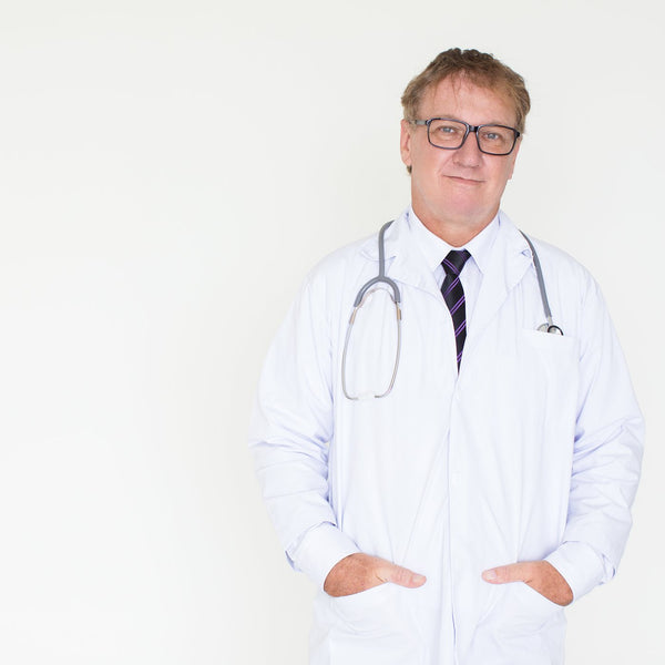 Mature doctor in a white coat
