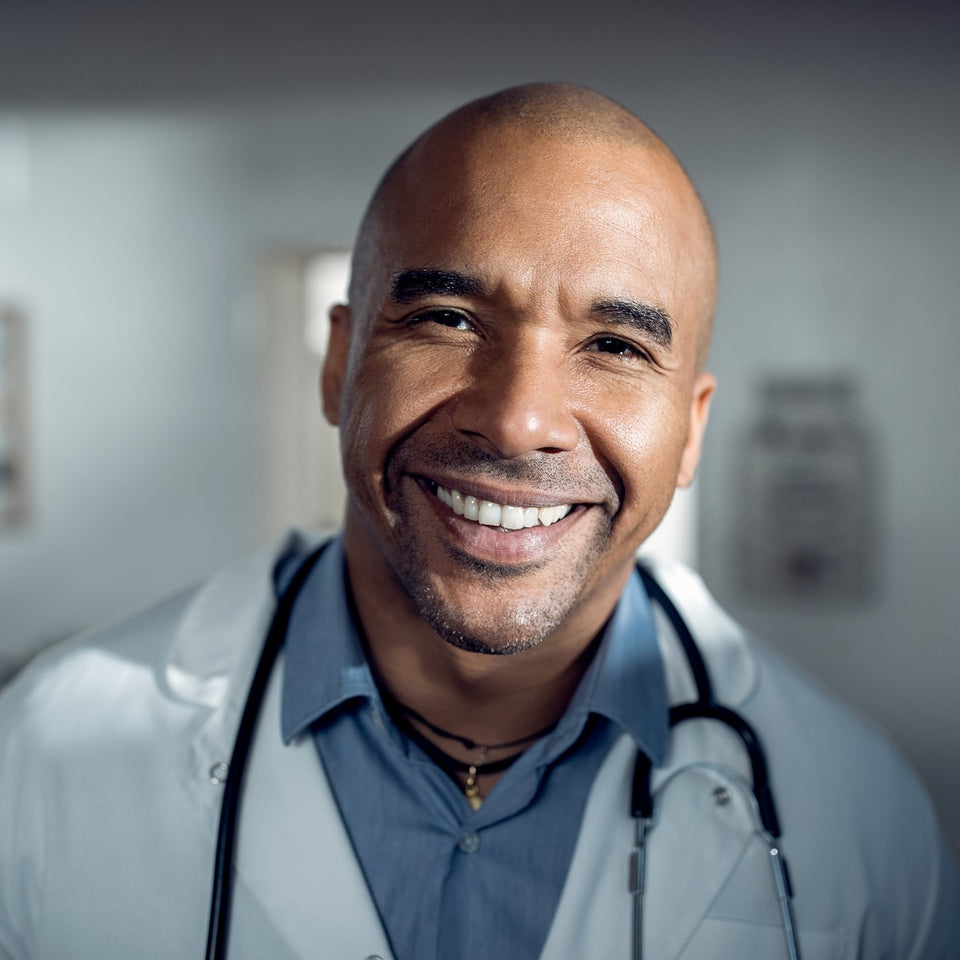 Smiling healthcare professional looking at camera
