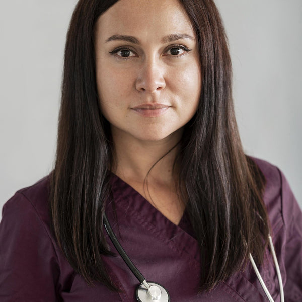 Female doctor with long hair in hospital uniform