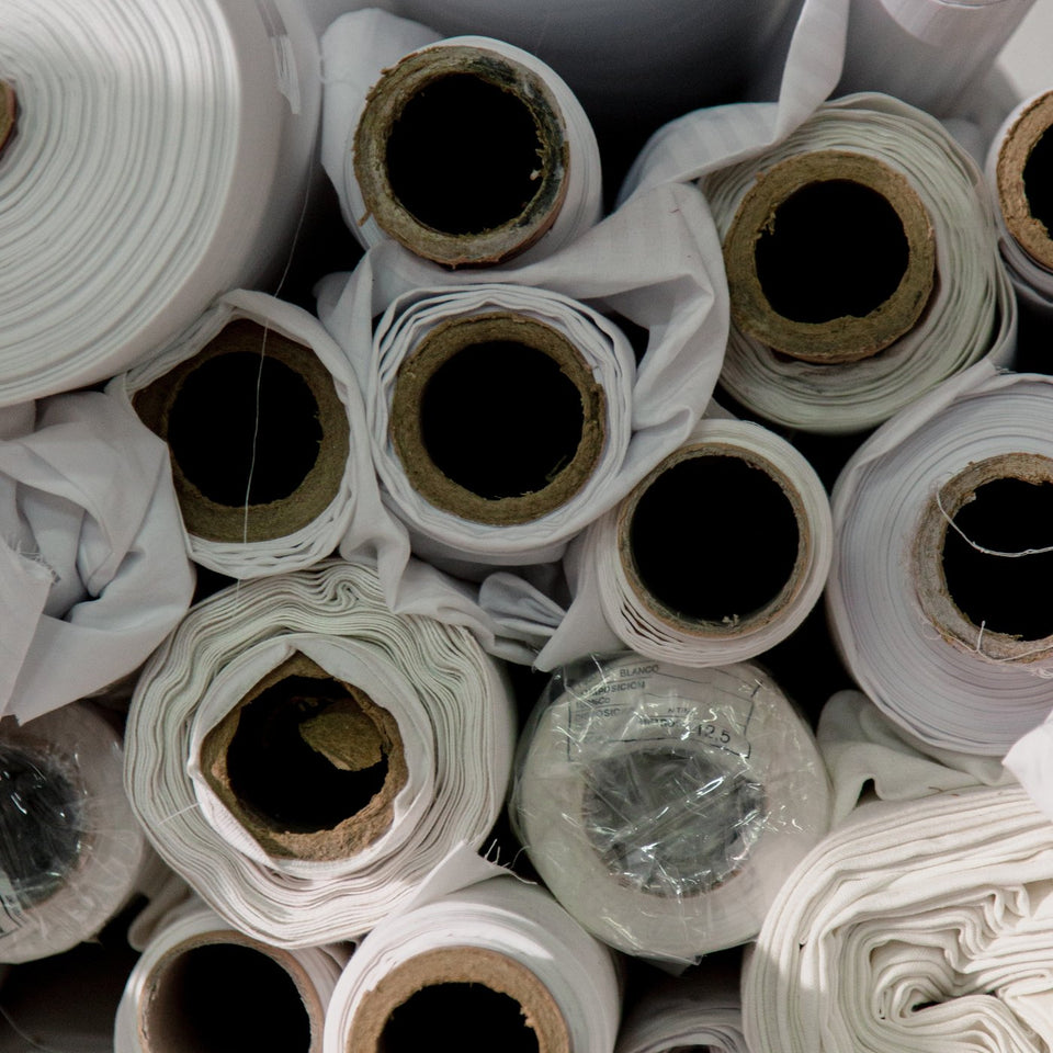 Rolls of fabric textile in a studio