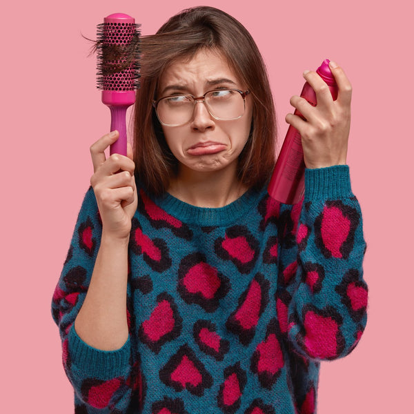 Person styling their hair