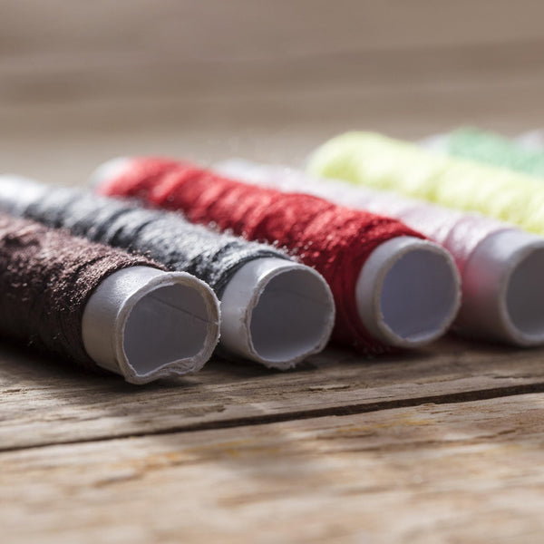 Colourful reels of embroidery thread