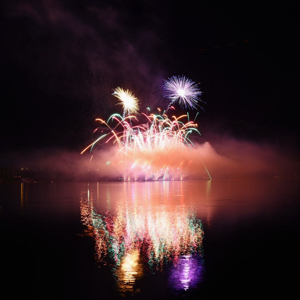 Fireworks over a city at night