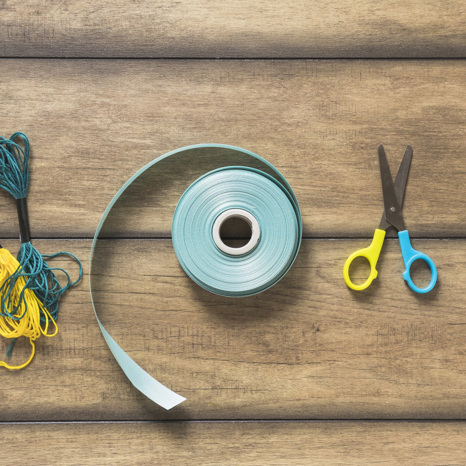 Roll of elastic tape with thread