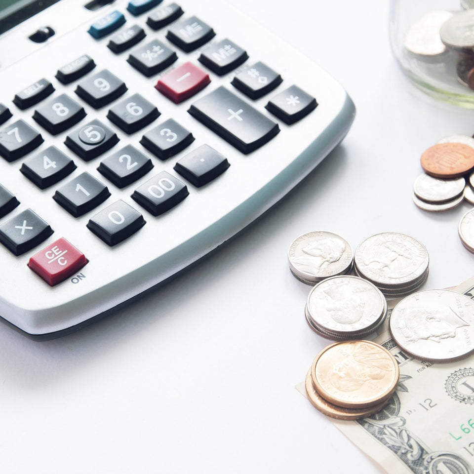 Calculator with coins and money