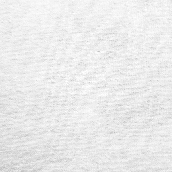 Close-up texture of soft white cotton towelling fabric