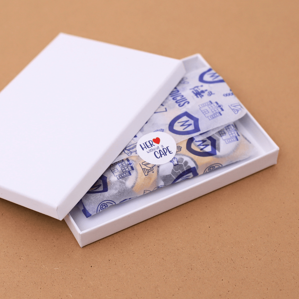 Premium gift wrapped Medicus scrub cap in presentation packaging