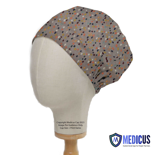 Abstract Crowd Scrub Cap from Medicus Scrub Caps, featuring a patterned design on a neutral background, displayed on a mannequin head.