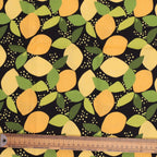 Abstract Lemon Tree Print Leaves scrub cap fabric pattern close-up