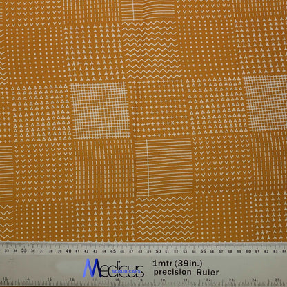 Abstract Lines On Mustard Theatre Scrub Cap from Medicus Scrub Caps, featuring a geometric patchwork design in white on a mustard background.