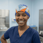 African Honeycomb Scrub Cap (Cobalt, Orange, White, Teal & Gold) scrub cap pattern detail on mannequin