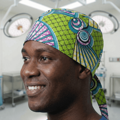 African Swirly Fan Scrub Cap (Leaf Green, Teal & Magenta) scrub cap shown on model