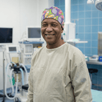 African Green & Purple Disc Scrub Cap (Lime, Violet, Coral & White) scrub cap pattern detail on mannequin