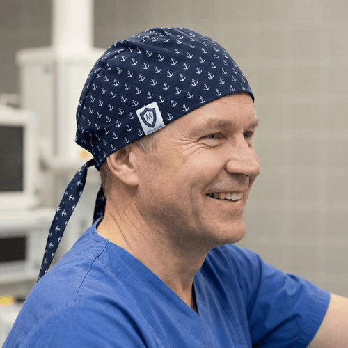 Anchors On Navy scrub cap shown on model