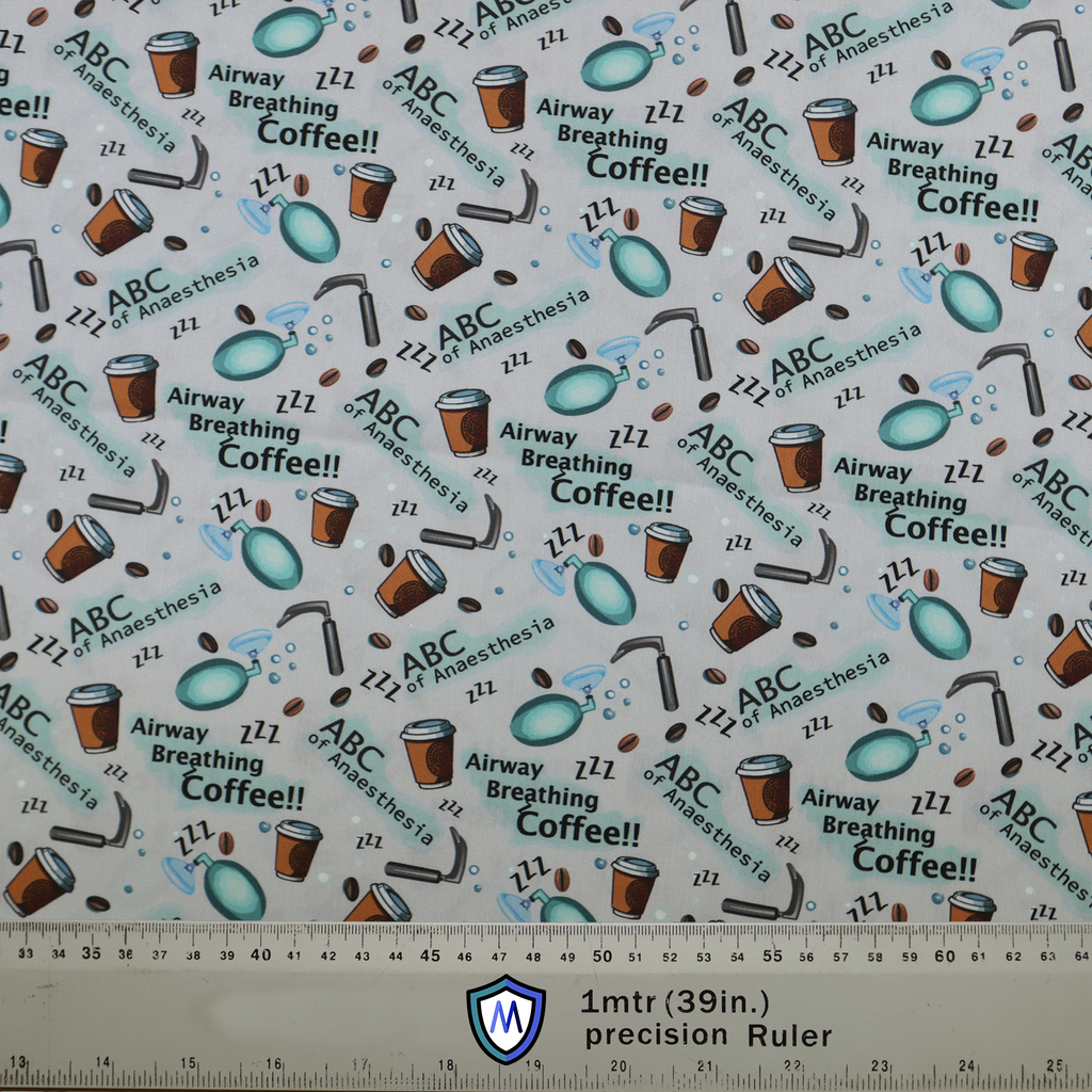 The Medicus Scrub Caps Anaesthetist ABCs scrub cap features airway, breathing, and coffee-themed patterns with medical icons, coffee cups, and a precision ruler for scale.