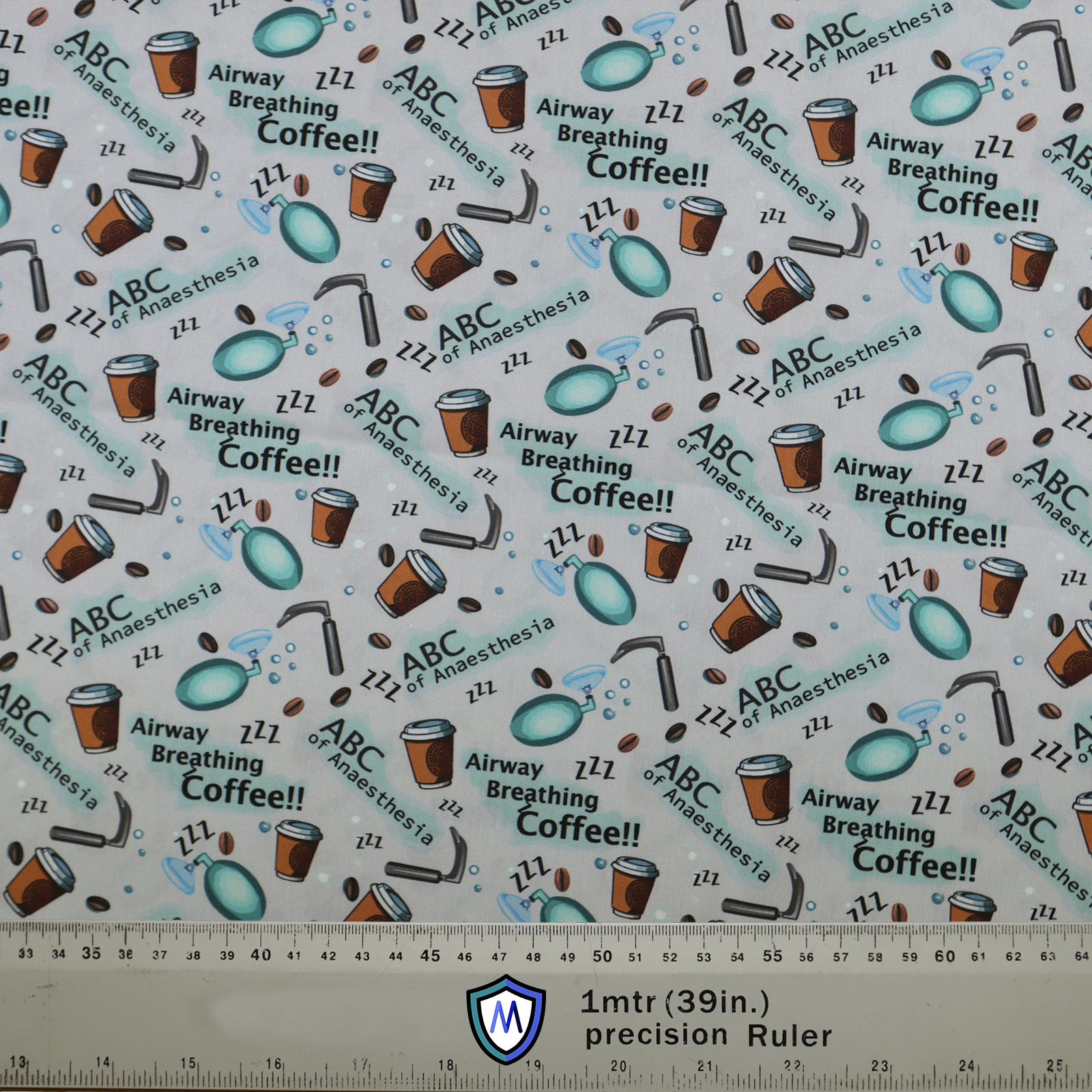 The Medicus Scrub Caps Anaesthetist ABCs scrub cap features airway, breathing, and coffee-themed patterns with medical icons, coffee cups, and a precision ruler for scale.