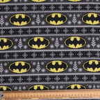 Christmas Batman Logo Jumper fabric pattern detail close-up