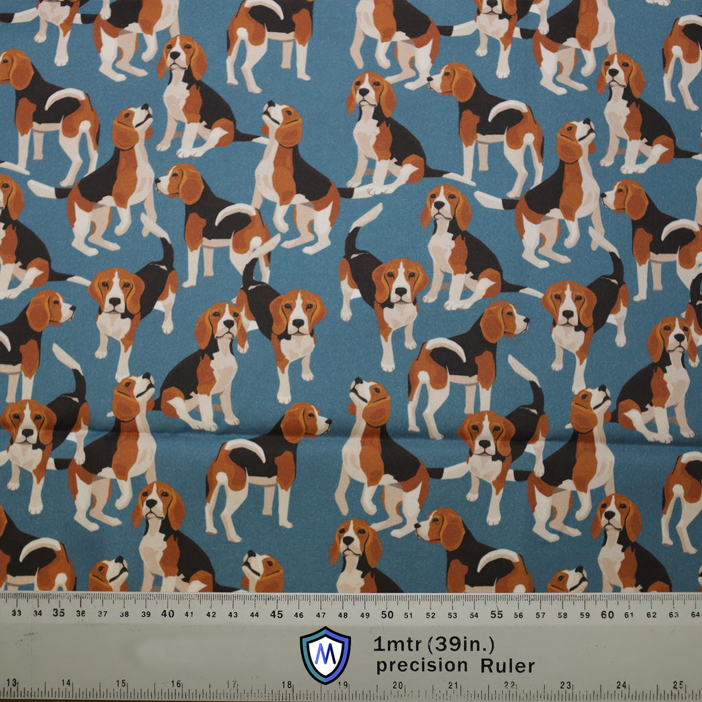 The Medicus Scrub Caps Beagle Dogs On Blue features playful beagle illustrations on a blue background, perfect for healthcare professionals. Fabric scale included at bottom.