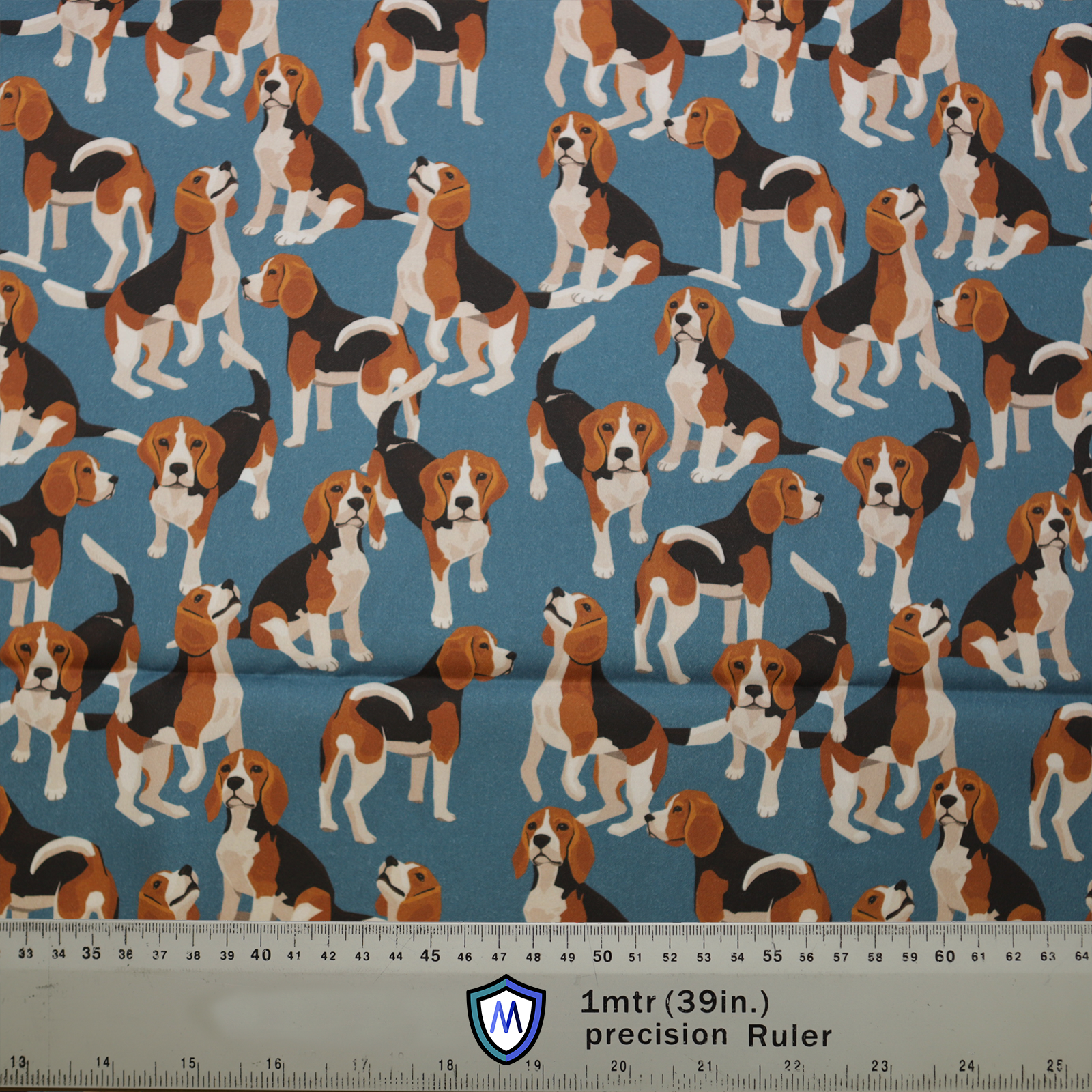 The Medicus Scrub Caps Beagle Dogs On Blue features playful beagle illustrations on a blue background, perfect for healthcare professionals. Fabric scale included at bottom.