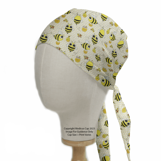 Bees Honey Pots Scrub Cap from Medicus Scrub Caps, featuring a playful bee and honey pot pattern on a light background.