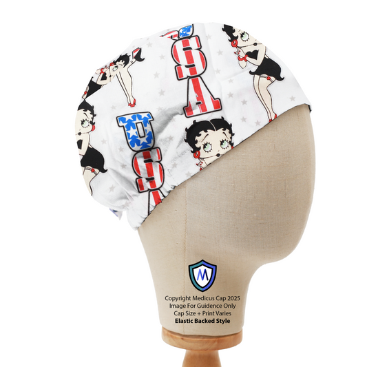 Mannequin head wearing a Medicus Scrub Cap featuring Betty Boop in American-themed outfits on a white background. Elastic backed style.