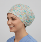 Birds Floral Blue And Pink scrub cap shown on model