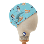 Bluey Bingo Dance and Skipping scrub cap fabric pattern close-up