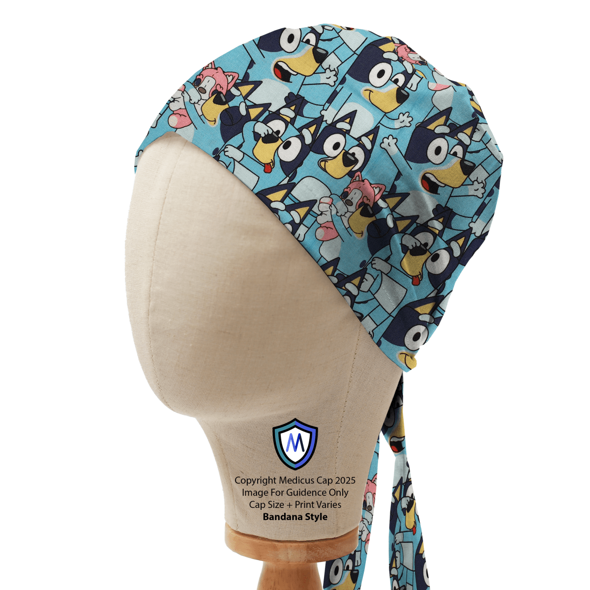 Blue Medicus scrub cap featuring a playful crowd of animated blue dogs in medical outfits. Bandana style with tie-back design.