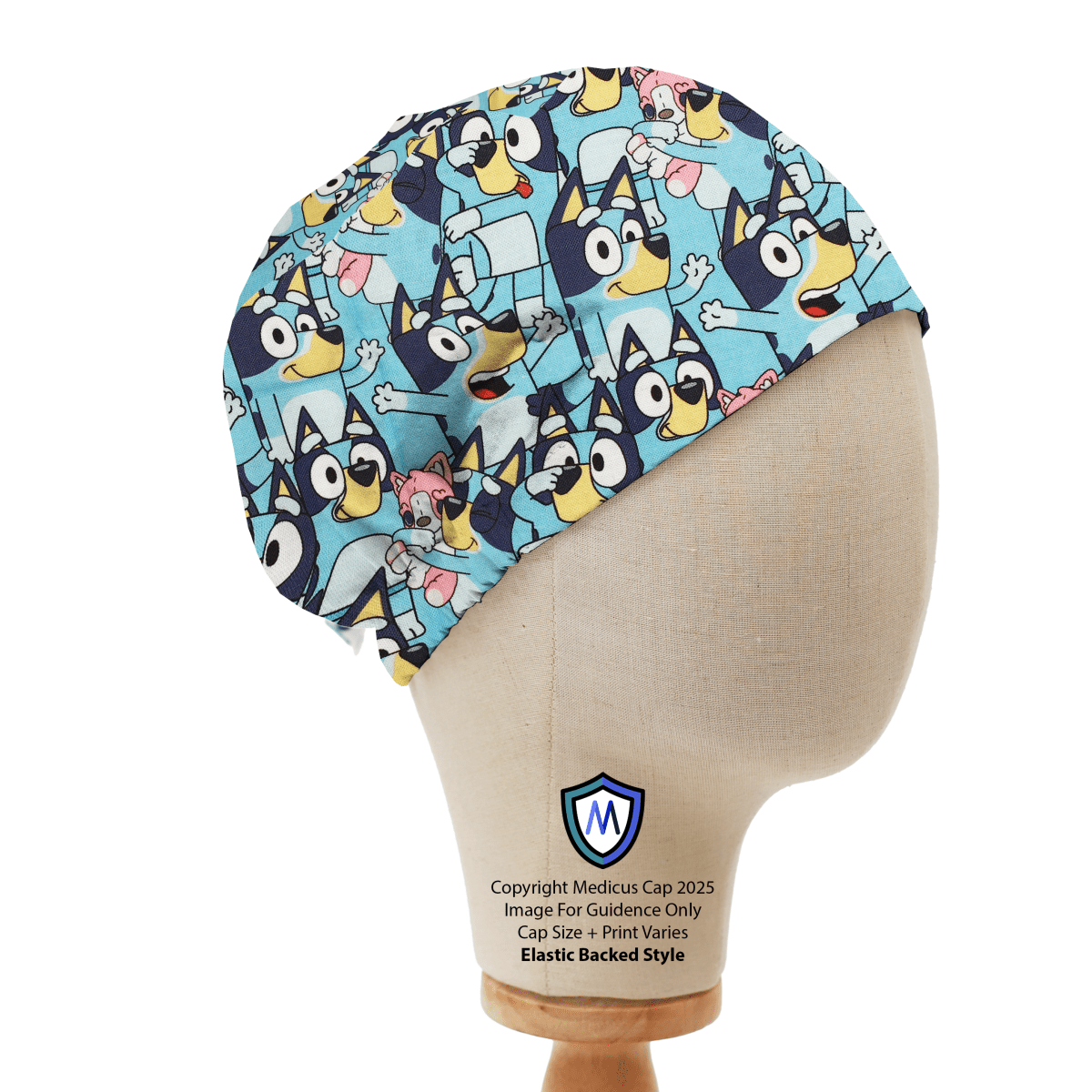 Medicus Scrub Cap featuring a colorful Bluey-themed design with multiple character expressions on a light blue background. Elastic-backed for comfort.