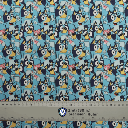 Bluey-themed Medicus Scrub Cap fabric featuring a fun, crowded pattern of Bluey and friends on a light blue background. Ruler for scale.