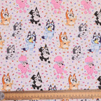 Bluey + Friends Confetti Party scrub cap fabric pattern close-up